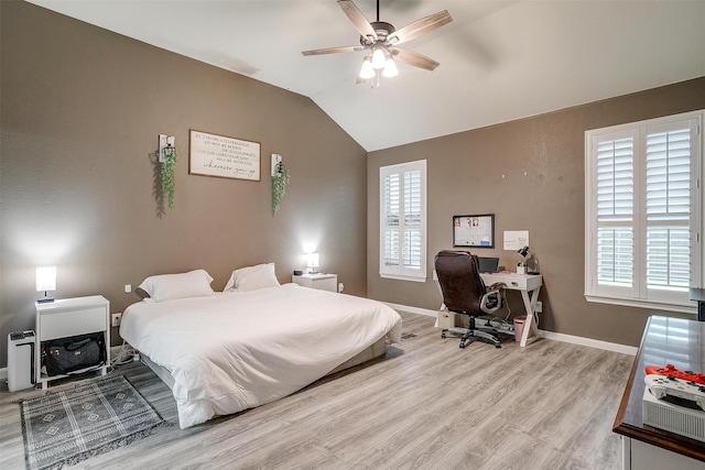 12225 Vienna Apple Rd, Fort Worth, TX 76244 - bedroom featuring light wood-style floors, vaulted ceiling, an office area, and a ceiling fan