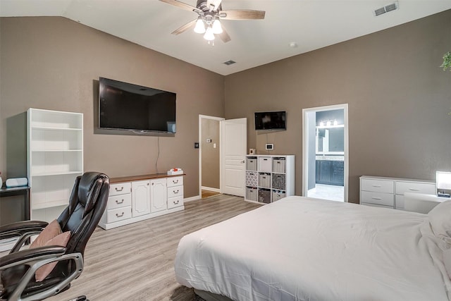 12225 Vienna Apple Rd, Fort Worth, TX 76244 - bedroom featuring lofted ceiling, light wood-type flooring, an office area, connected bathroom, and a ceiling fan
