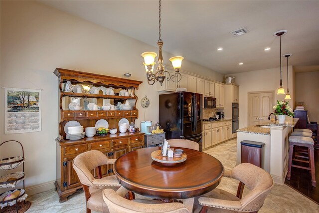 189 Charleston Ln, Fate, TX 75189 - dining space with a chandelier and recessed lighting