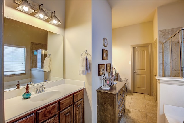 189 Charleston Ln, Fate, TX 75189 - bathroom featuring vanity, a shower stall, tile patterned floors, and a bathtub