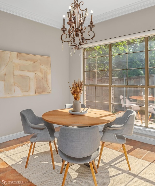 552 Grand Oaks Dr, Shreveport, LA 71106 - dining area with a chandelier, ornamental molding, and baseboards