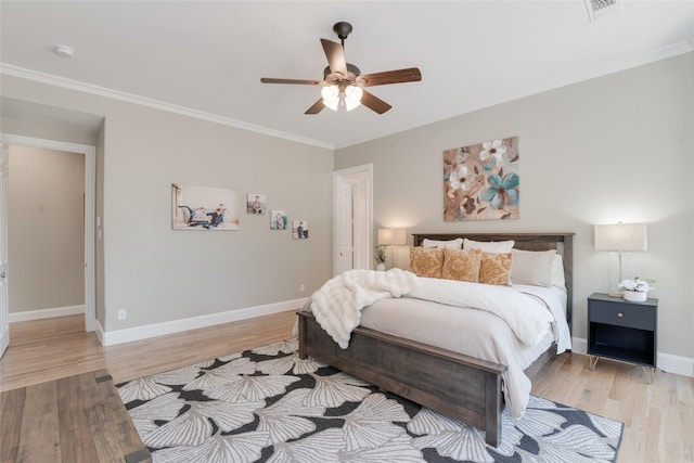 8008 Craftsbury Ln, Mckinney, TX 75071 - bedroom with light wood-style flooring, crown molding, and a ceiling fan