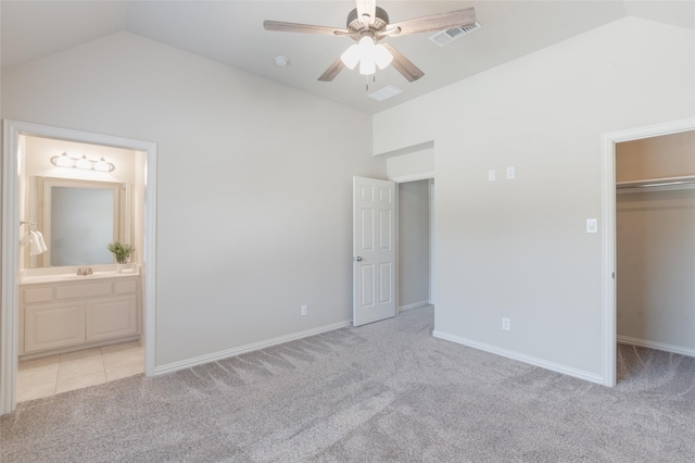 8008 Craftsbury Ln, Mckinney, TX 75071 - unfurnished bedroom with vaulted ceiling, carpet flooring, a walk in closet, ensuite bathroom, and a closet