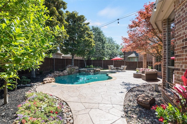 8008 Craftsbury Ln, Mckinney, TX 75071 - view of pool featuring a fenced backyard, a patio, and an outdoor hangout area