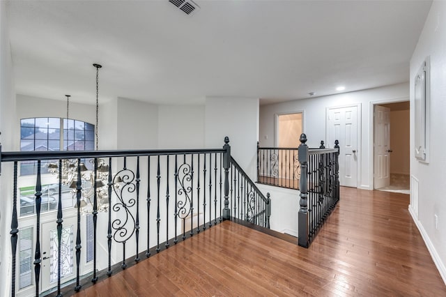 3612 Waynoka Dr, Carrollton, TX 75007 - hallway featuring an upstairs landing, wood finished floors, baseboards, and recessed lighting