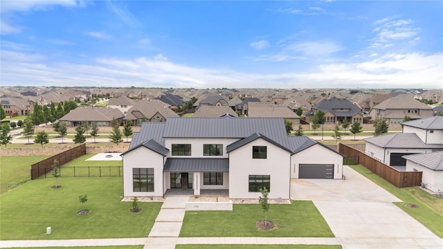 1106 Knoll Crest Dr, Mansfield, TX 76063 - modern farmhouse with a residential view, a standing seam roof, driveway, metal roof, and stucco siding