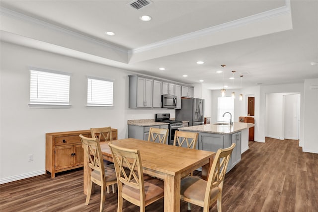 7668 Monument Dr, Little Elm, TX 76227 - dining room with crown molding, recessed lighting, and dark wood-style floors