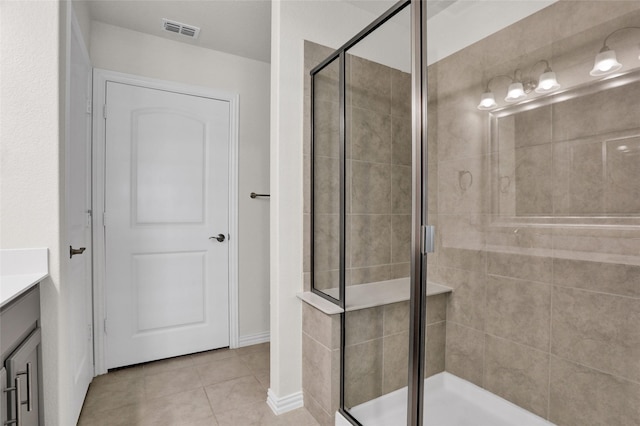 7668 Monument Dr, Little Elm, TX 76227 - full bathroom with vanity, a shower stall, and tile patterned flooring