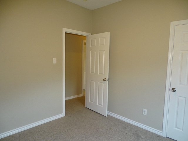 2013 Alanbrooke Dr, Fort Worth, TX 76140 - unfurnished bedroom with light carpet and baseboards