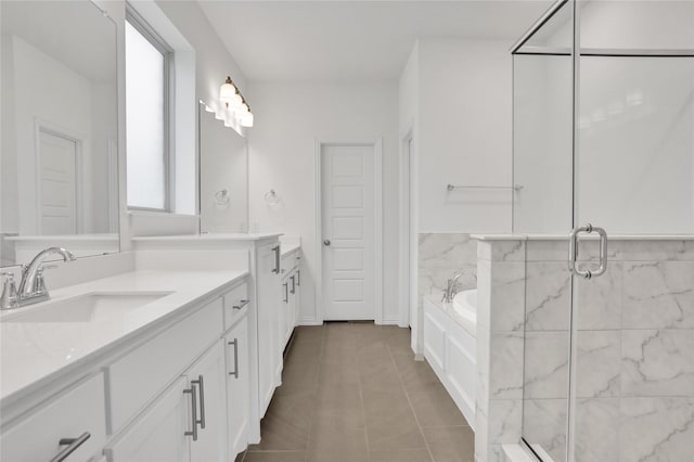 545 Oakmoss St, Little Elm, TX 76227 - full bath with vanity, a garden tub, a stall shower, and tile patterned floors