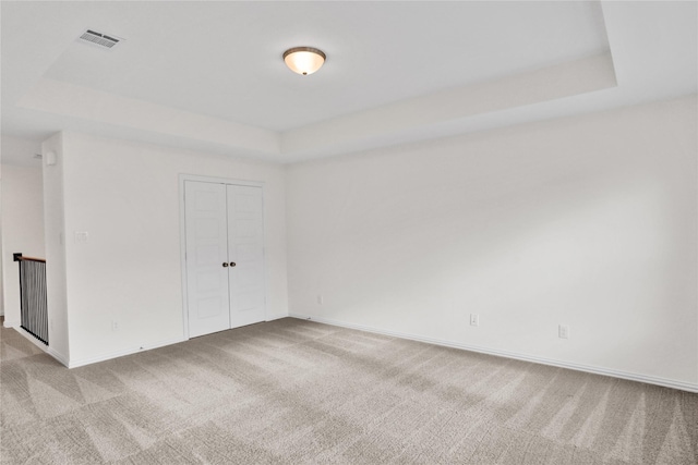 545 Oakmoss St, Little Elm, TX 76227 - unfurnished room with a tray ceiling and carpet floors