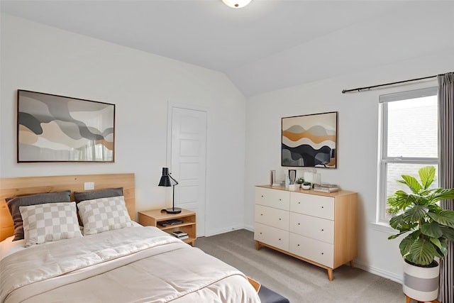 545 Oakmoss St, Little Elm, TX 76227 - bedroom with vaulted ceiling and light colored carpet