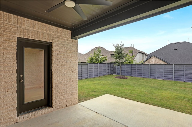 545 Oakmoss St, Little Elm, TX 76227 - fenced backyard with ceiling fan and a patio