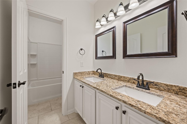 1021 Tara Dr, Burleson, TX 76028 - bathroom featuring double vanity, tile patterned floors, and shower / tub combination