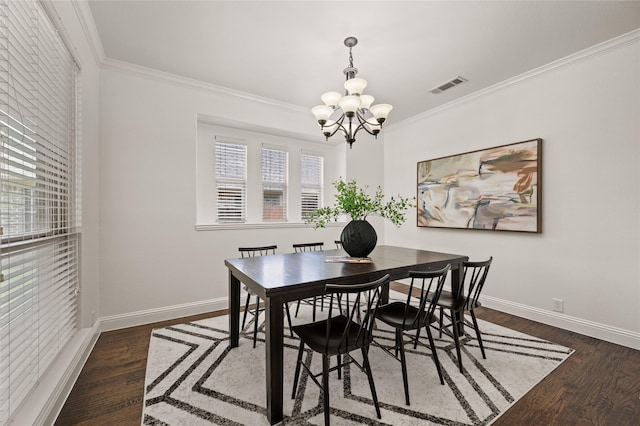 1021 Tara Dr, Burleson, TX 76028 - dining room with a chandelier, ornamental molding, and dark wood-style floors