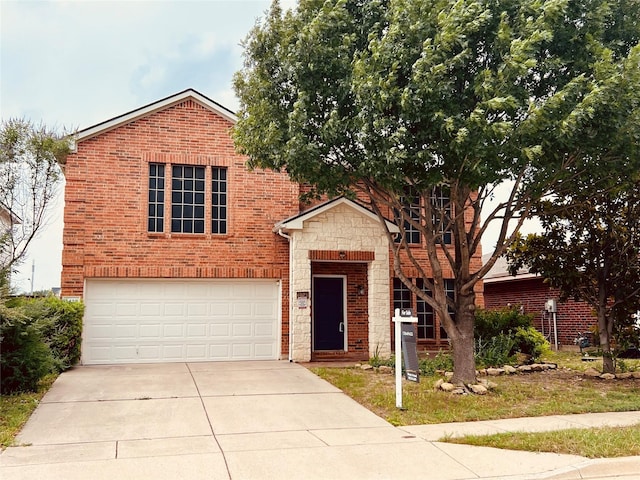 3428 Baby Doe Ct, Fort Worth, TX 76137 - view of front of house featuring stone siding, driveway, a garage, and brick siding