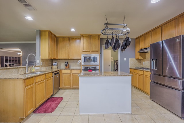 3428 Baby Doe Ct, Fort Worth, TX 76137 - kitchen with appliances with stainless steel finishes, a sink, under cabinet range hood, decorative backsplash, and light tile patterned flooring