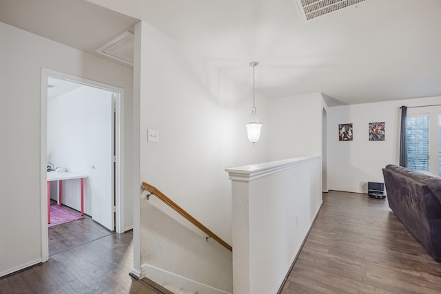 3428 Baby Doe Ct, Fort Worth, TX 76137 - hall with an upstairs landing, attic access, wood finished floors, and baseboards