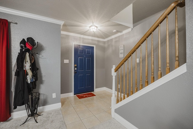 3428 Baby Doe Ct, Fort Worth, TX 76137 - foyer entrance featuring stairway, tile patterned floors, a textured ceiling, ornamental molding, and baseboards