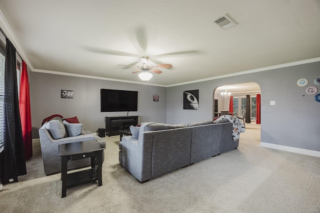 3428 Baby Doe Ct, Fort Worth, TX 76137 - living room featuring arched walkways, carpet flooring, a ceiling fan, ornamental molding, and baseboards