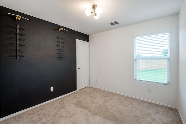 6851 Coulter Dr, Princeton, TX 75407 - spare room featuring healthy amount of natural light and carpet flooring