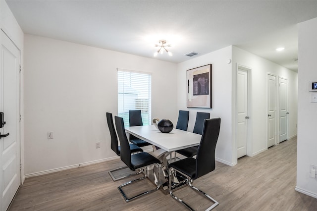 6851 Coulter Dr, Princeton, TX 75407 - dining space with light wood-style floors and recessed lighting