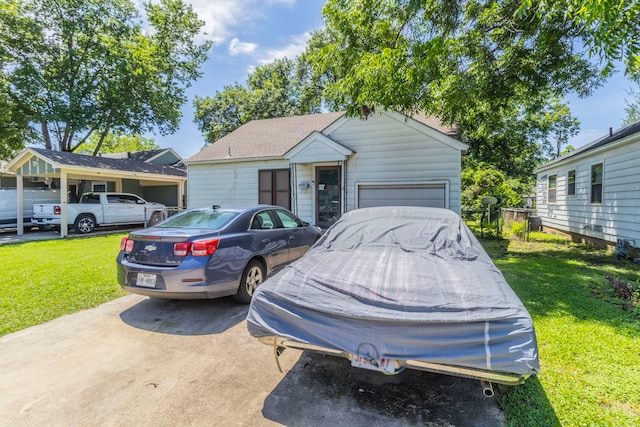 1213 Pine St, Grand Prairie, TX 75050 - view of front of home with driveway, a front lawn, and an attached garage