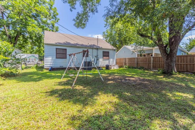 1213 Pine St, Grand Prairie, TX 75050 - view of rear view of house