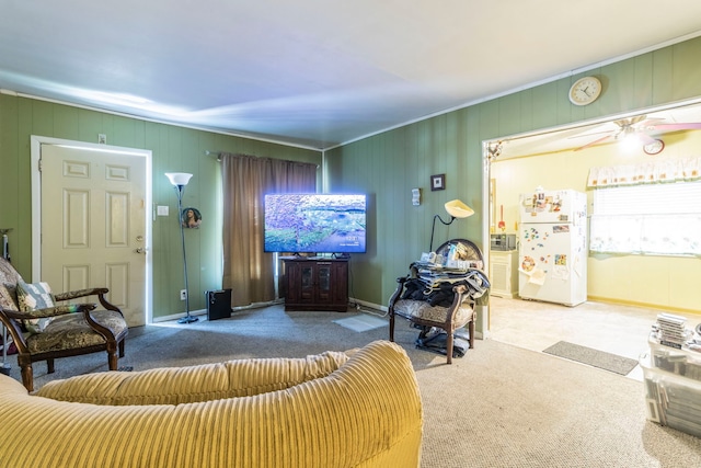 1213 Pine St, Grand Prairie, TX 75050 - living room featuring carpet flooring, ceiling fan, and baseboards