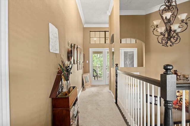 1578 Stainback Rd, Red Oak, TX 75154 - foyer entrance featuring carpet floors, a chandelier, ornamental molding, and a high ceiling