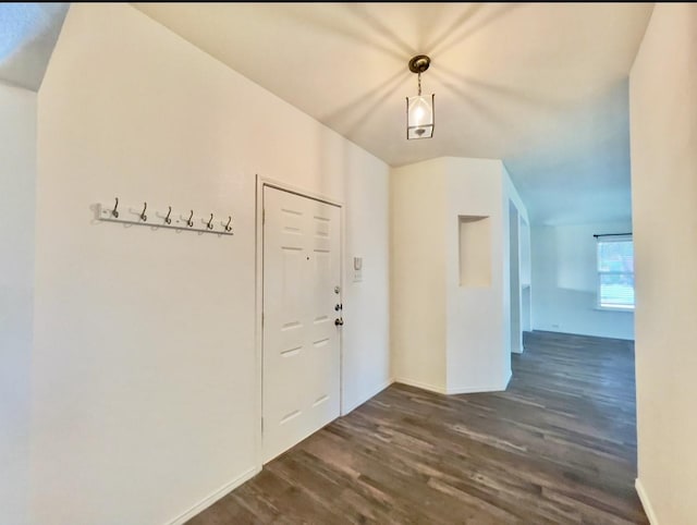 9117 Bastille Way, Frisco, TX 75033 - entrance foyer with dark wood-style floors and baseboards