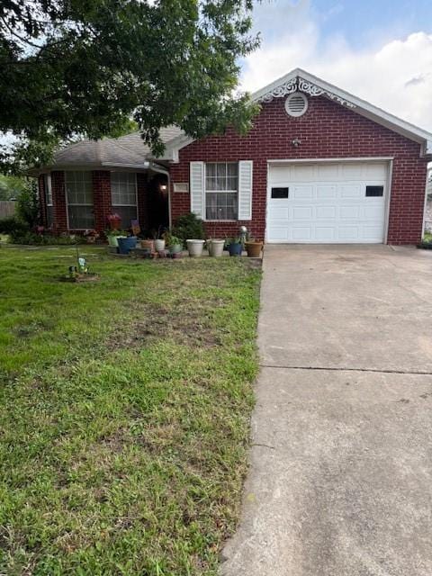 502 E College St, Leonard, TX 75452 - ranch-style house with concrete driveway, brick siding, a garage, and a front yard