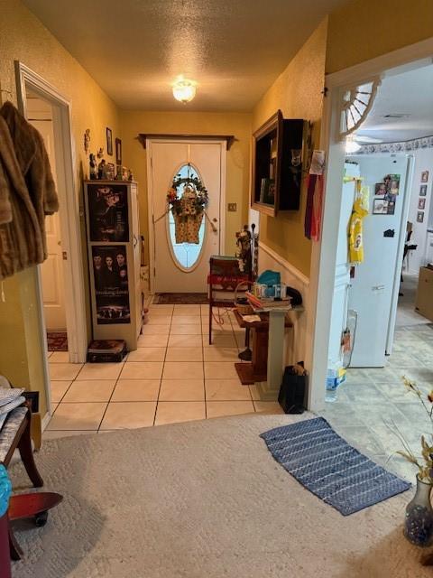 502 E College St, Leonard, TX 75452 - foyer entrance with light tile patterned flooring