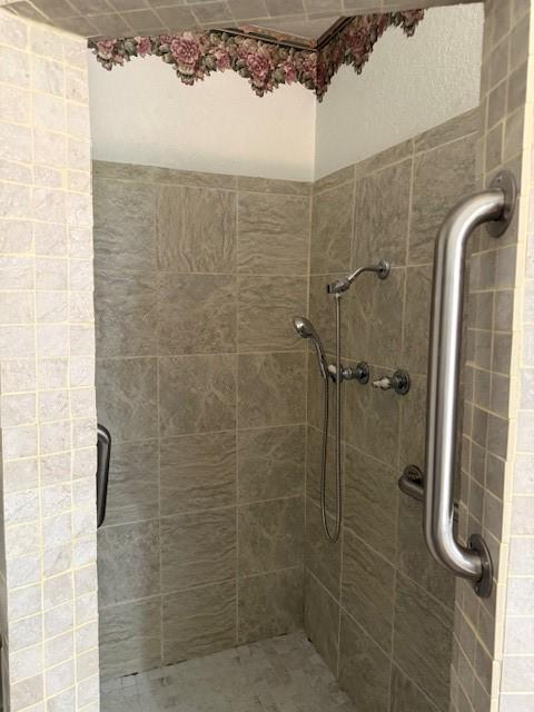 502 E College St, Leonard, TX 75452 - bathroom featuring a shower stall