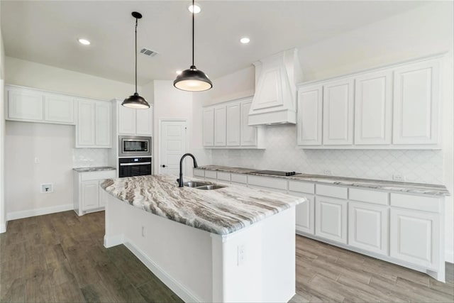 701 Winecup Way, Midlothian, TX 76065 - kitchen featuring a sink, custom range hood, appliances with stainless steel finishes, white cabinets, and backsplash