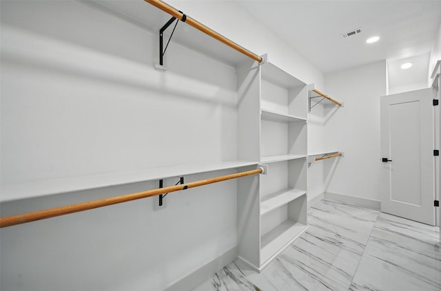 5334 Blackmore Ave, Fort Worth, TX 76107 - walk in closet with light marble finish flooring