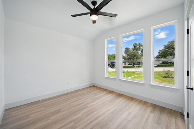 5334 Blackmore Ave, Fort Worth, TX 76107 - spare room featuring light wood finished floors, a ceiling fan, vaulted ceiling, and baseboards