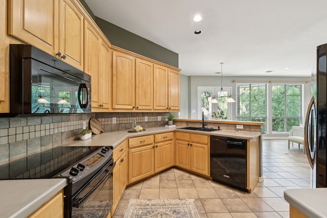 5321 Joe Wilson Rd, Midlothian, TX 76065 - kitchen with black appliances, light brown cabinets, a peninsula, and recessed lighting