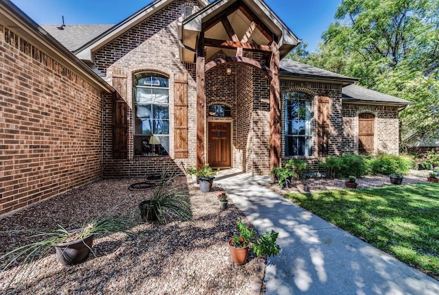 5321 Joe Wilson Rd, Midlothian, TX 76065 - doorway to property featuring brick siding and roof with shingles