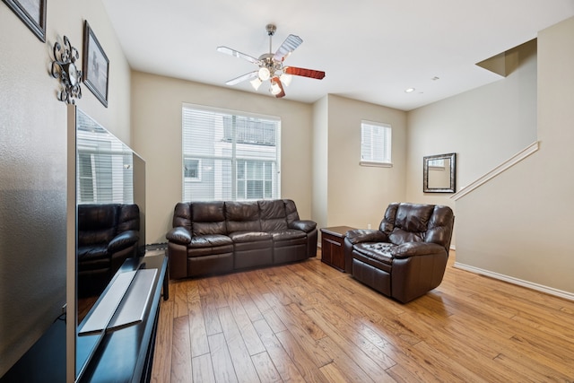 4121 Mckinney Ave Unit 21, Dallas, TX 75204 - living room featuring light wood finished floors, a ceiling fan, and recessed lighting