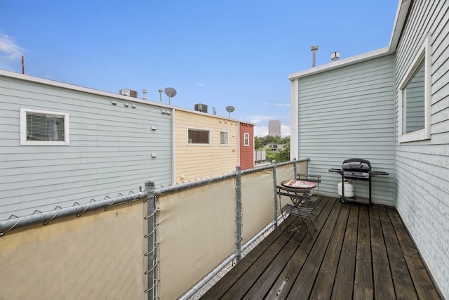 4121 Mckinney Ave Unit 21, Dallas, TX 75204 - wooden deck featuring grilling area