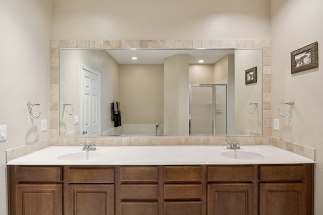 4121 Mckinney Ave Unit 21, Dallas, TX 75204 - bathroom with a shower stall and double vanity