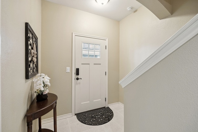 4121 Mckinney Ave Unit 21, Dallas, TX 75204 - entrance foyer featuring light tile patterned flooring and arched walkways