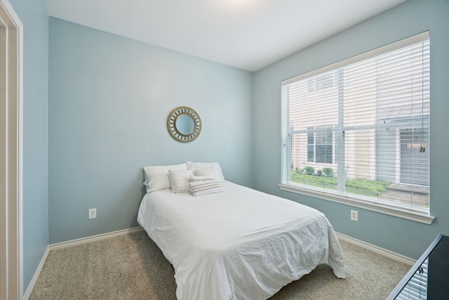 4121 Mckinney Ave Unit 21, Dallas, TX 75204 - carpeted bedroom with multiple windows