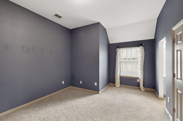 5766 Wellington Ln, Frisco, TX 75033 - spare room featuring carpet floors and lofted ceiling