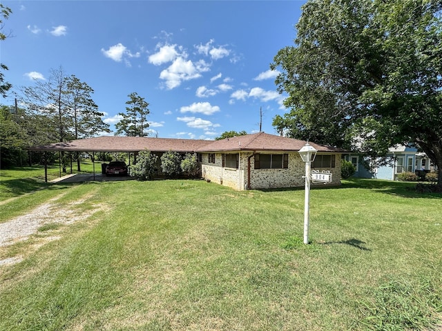 904 W 12th St, Cisco, TX 76437 - single story home with a front lawn, driveway, and a carport