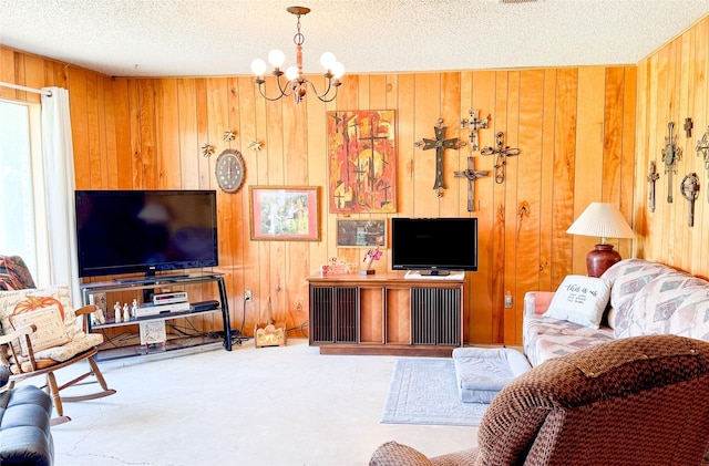 904 W 12th St, Cisco, TX 76437 - living room with a chandelier, a textured ceiling, and wood walls