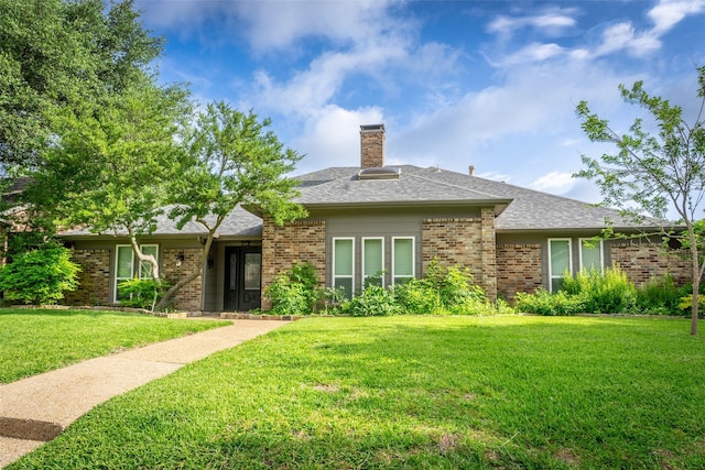 1104 Chesterton Dr, Richardson, TX 75080 - single story home featuring brick siding, a front lawn, a chimney, and roof with shingles