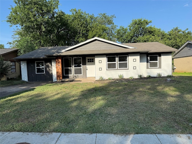 7118 Arborcrest Dr, Dallas, TX 75232 - ranch-style house featuring a front yard and brick siding