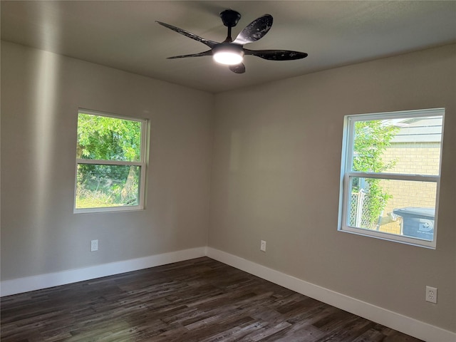 7118 Arborcrest Dr, Dallas, TX 75232 - spare room featuring dark wood finished floors and a ceiling fan